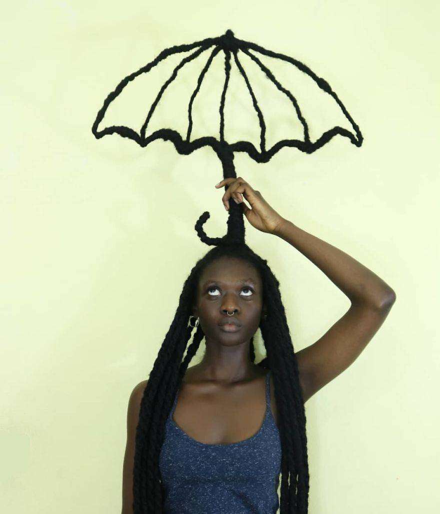 Laetitia Ky è un'artista africana che modella i capelli creando figure Laetitia Ky è un'artista africana che modella i capelli creando figure